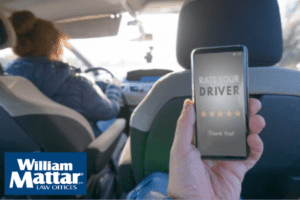 passenger in car using rideshare app