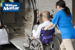 man in wheelchair entering handicap accessible van