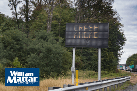 sign warning of crash on highway
